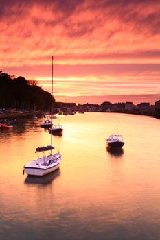 Entrance to weymouth harbour at dusk in southern england