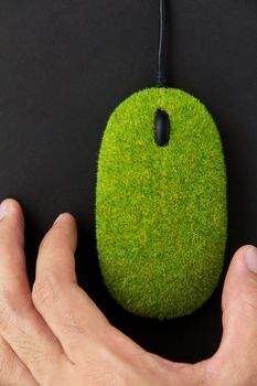 hand with eco computer mouse