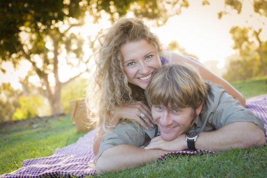 Happy Attractive Loving Couple Portrait in the Park.