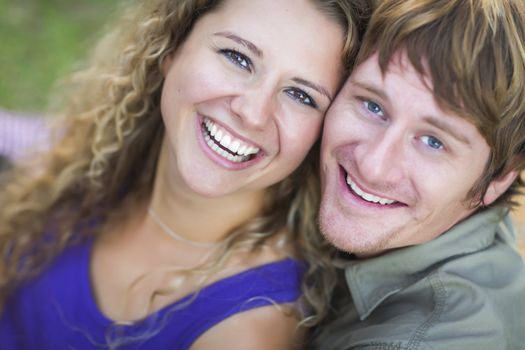 An Attractive Couple Enjoying A Day in the Park Together.