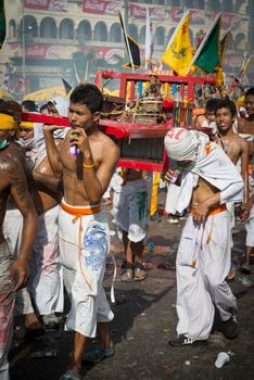 Phuket, Thailand - October 21, 2012: An unidentified people on street processions of Phuket Vegetarian Festival. It is an annual event held during the ninth lunar month of the Chinese calendar. 