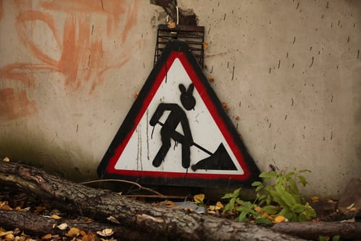 The sign are working hare graffiti