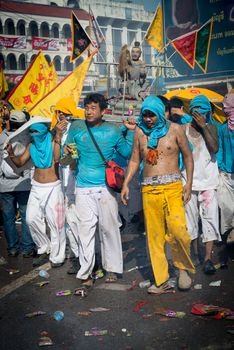 Phuket, Thailand - October 21, 2012: An unidentified people on street processions of Phuket Vegetarian Festival. It is an annual event held during the ninth lunar month of the Chinese calendar. 