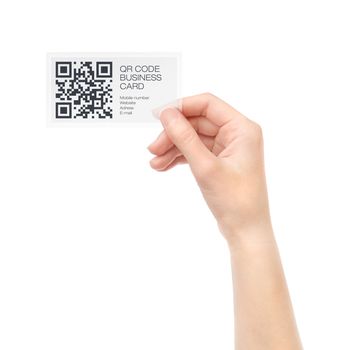 Female hand holding transparent business card with QR code information. Isolated on white.