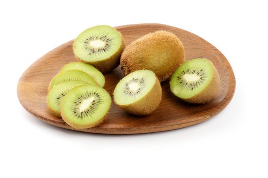 Perfect Kiwi Full Body and Slices on Wooden Plate isolated on white background