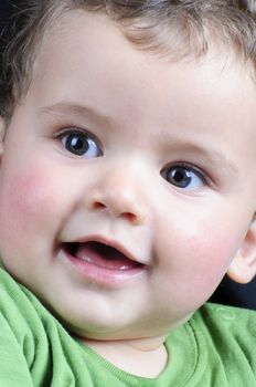 beautiful blond boy smiling