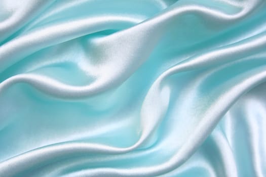 Smooth elegant blue silk can use as background
