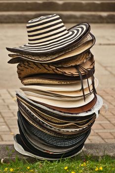 A stack of hats, sombrero vueltiado, one of the symbols of Colombia