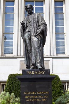 Statue to famous English Scientist Michael Faraday - located in Savoy Place in London.