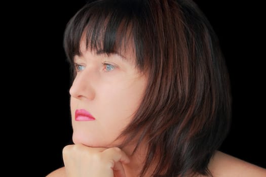 Portrait of woman with blue eyes and black hair