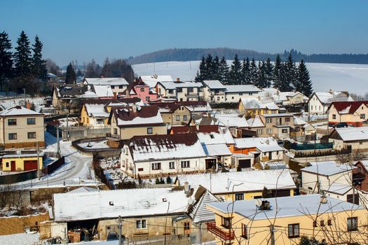 Aerial view of small village in winter, Czech Republic.