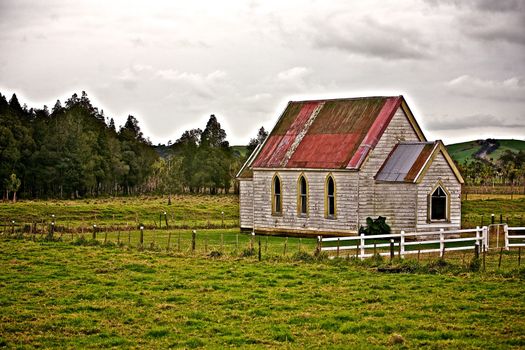 A Historic Weathered Church in the Field