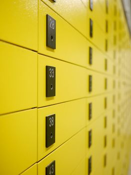 yellow private mail boxes at a post office in Croatia