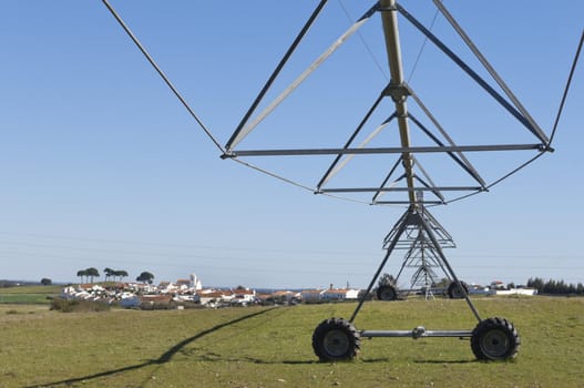 Irrigation pivot resting in a grass field of Alentejo, Portugal