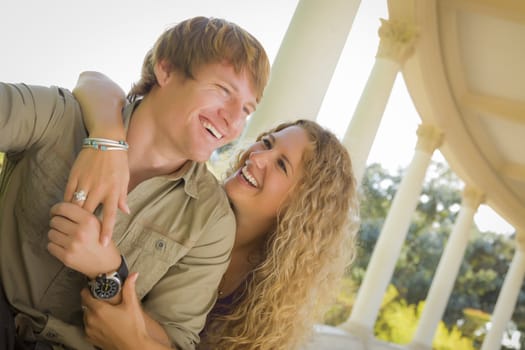 Happy Attractive Loving Couple Portrait in the Park.