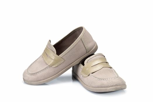 Beige shoes for kids isolated on a white background