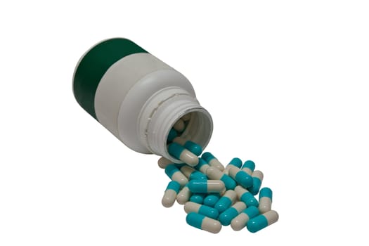Drug Capsule in Medicine Bottle on a white background.