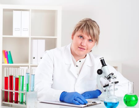 female doctor working in the lab, doing research