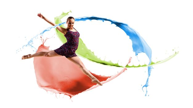 Dancer jumping on the background color paint splashes