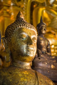 Texture of face old buddha in temple