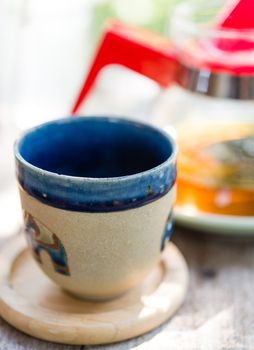 cup of tea on table in afternoon time