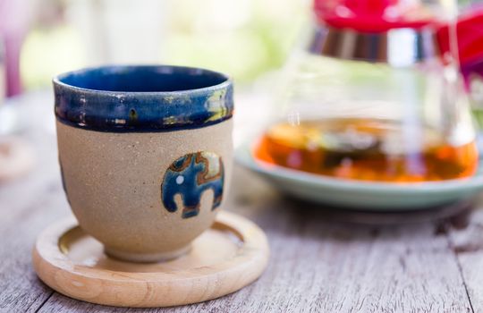 cup of tea on table in afternoon time