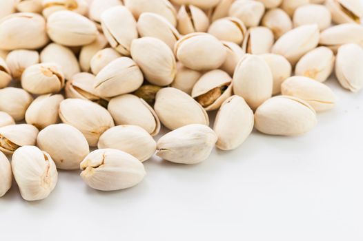 close up pistachios nuts on white background