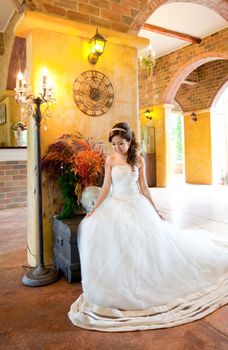 Beautiful Bride indoors in Italian building