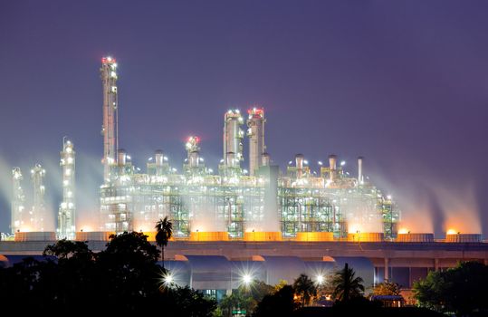 Oil Refinery plant with Power generator at dusk