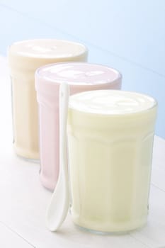 Fresh, healthy and delicious creamy yogurt in vintage French jar, the perfect snack or dessert.