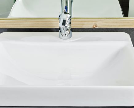 Close-up of lavatory faucet in a newly constructed house