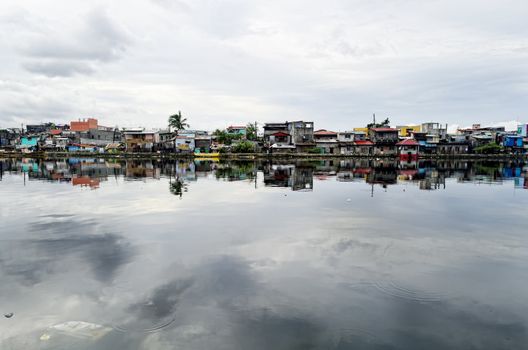 Rows of houses along the Malabon River in Metro Manila, Philippines