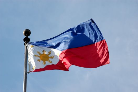 Full shot of wind blown flag of the Philippines