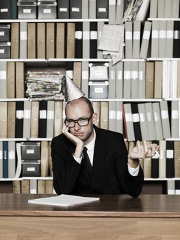 Tired Businessman with cigarette at the office