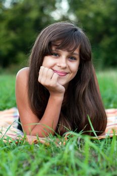 Brunette teen girl on nature