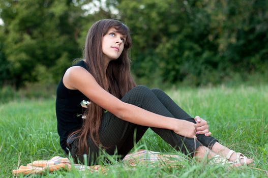 Brunette teen girl on nature