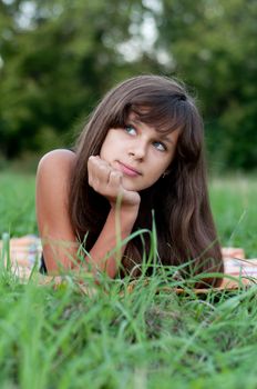 Brunette teen girl on nature