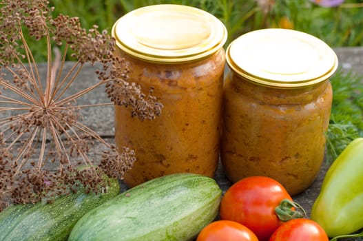 canned vegetables zucchini in a glass jar