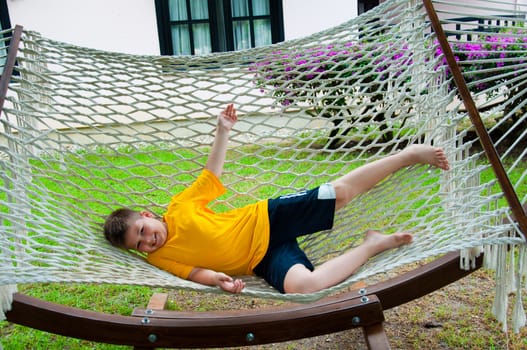 Boy resting in a hammock