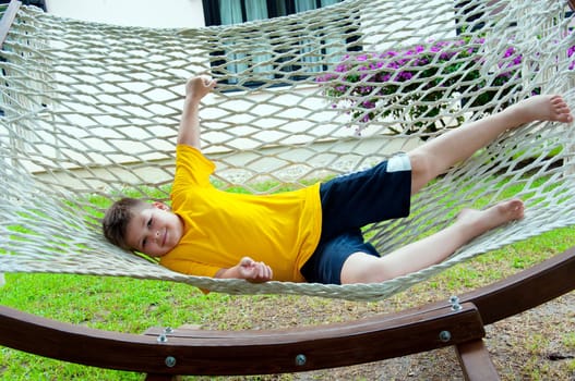 Boy resting in a hammock