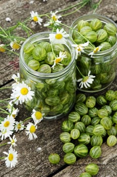 Cooking homemade gooseberry jam