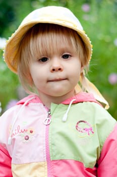 Little girl with flowers 2.5 years