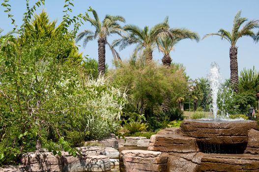 Landscaping - a stone fountain and pond