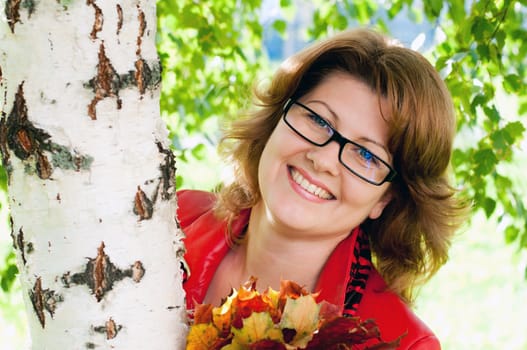 Woman with glasses in the park