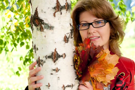 Woman with glasses in the park