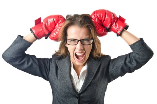 Young businesswoman in boxing concept