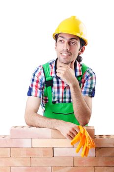 Builder with hard hat on white