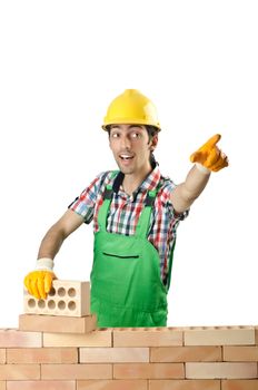 Builder with hard hat on white