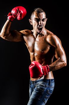 Young man with boxing gloves