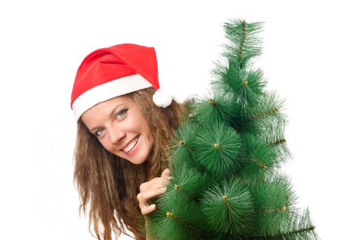 Young woman with christmas tree